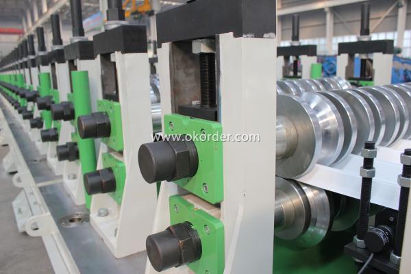 Metal panel roll forming machine