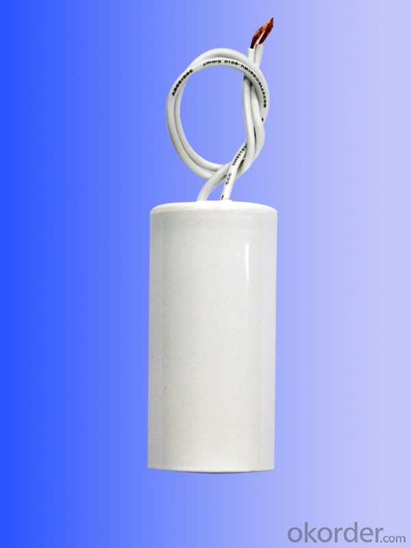 white  plastic can  with line motor running capacitors