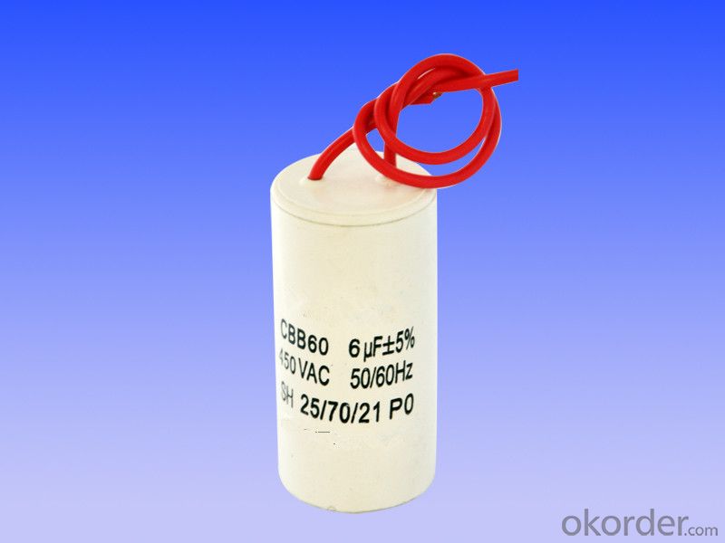 white  plastic can  with line motor running capacitors