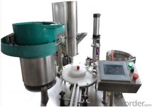 Powder Filling and Capping, Plugging and Crimping Machine System 1