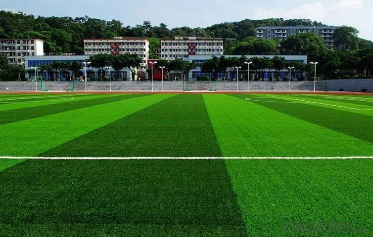 Unfaded, easily cleared artificial turf System 1